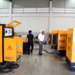 diesel generator load bank testing in factory workshop with portable load bank connected during commissioning